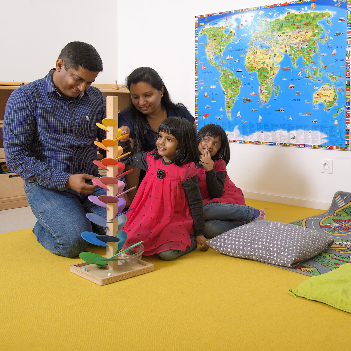 Children with their parents in the kindergarden of Infineon