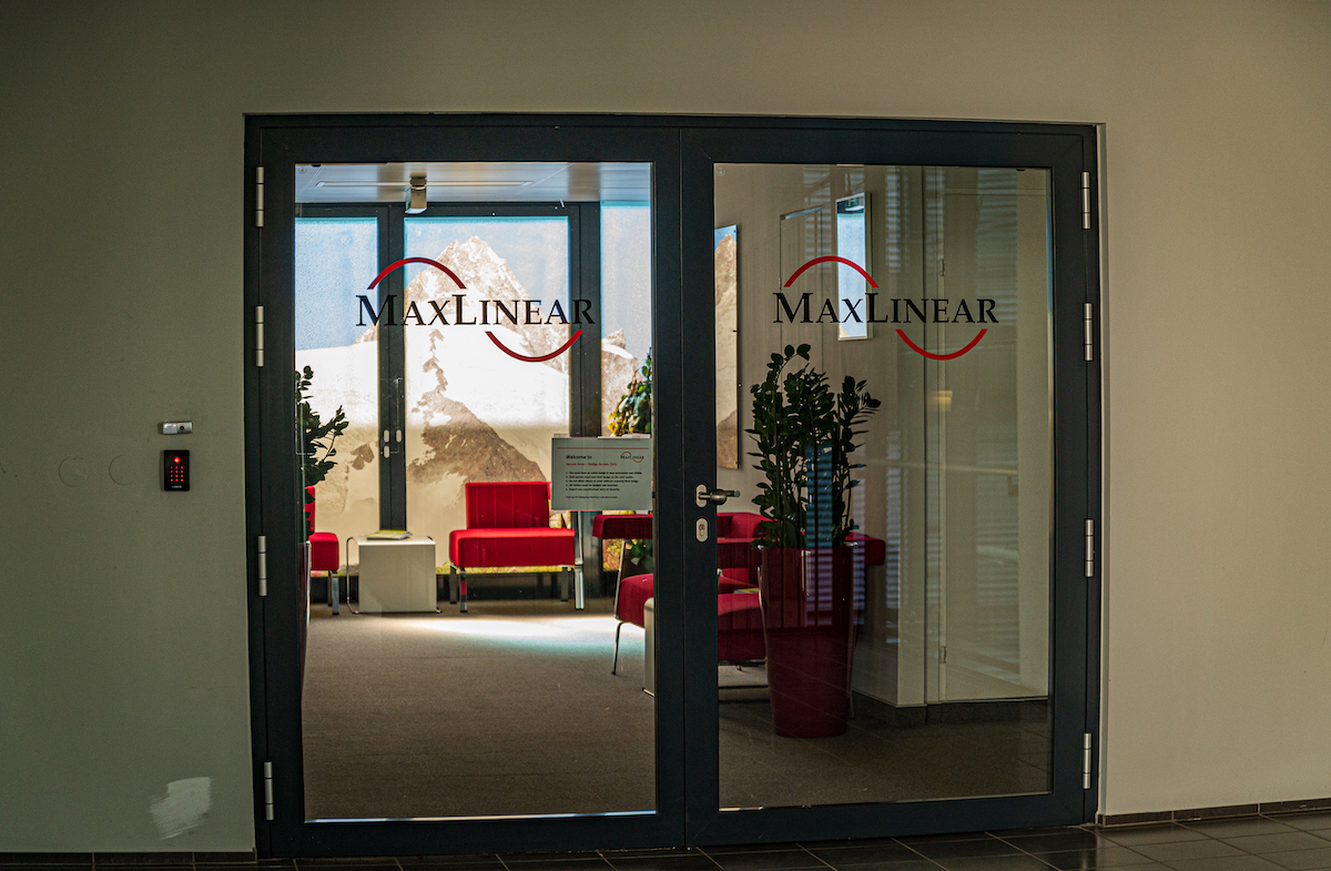 Glass door with the lettering "MaxLinear"
